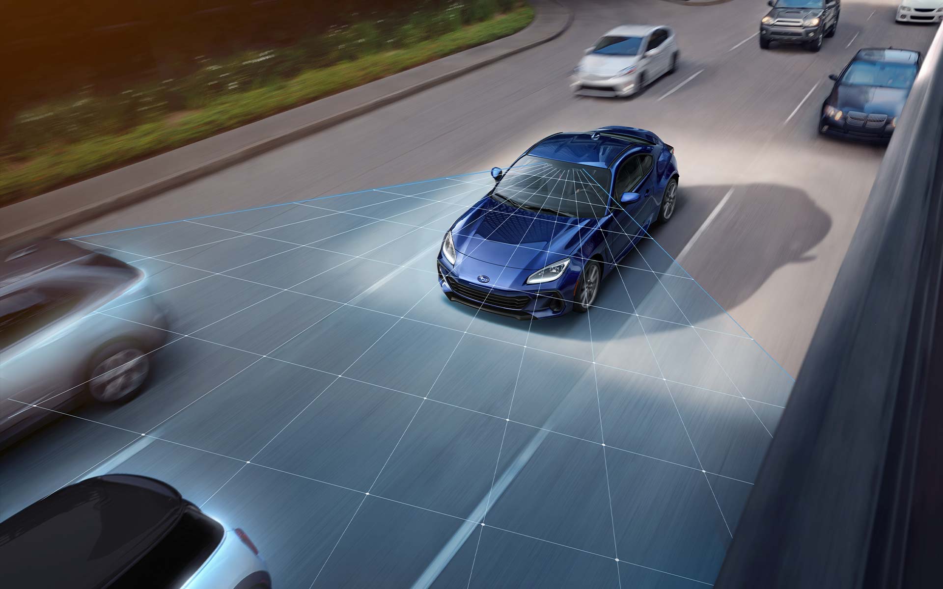 A photo illustration showing the EyeSight® Driver Assist Technology sensors on a 2022 Subaru BRZ driving down a highway.